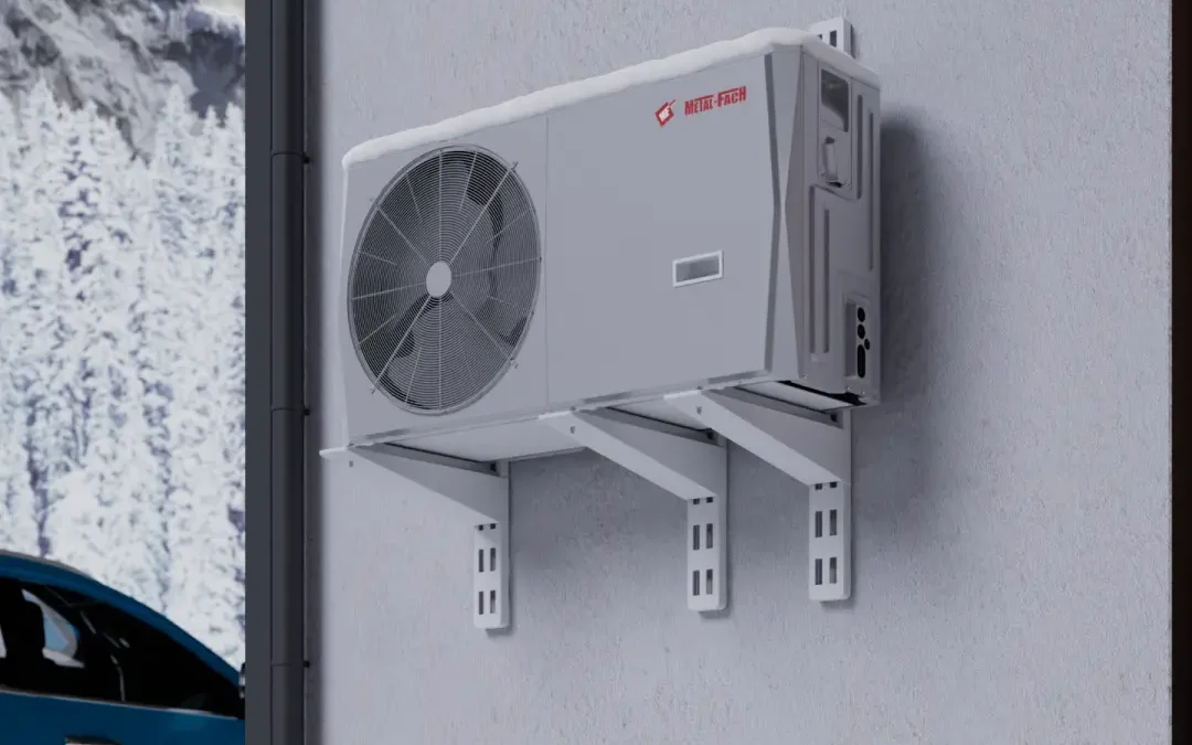 Pompa ciepła METAL-FACH Elika Monoblock 8–16 kW zamontowana na ścianie budynku zimą